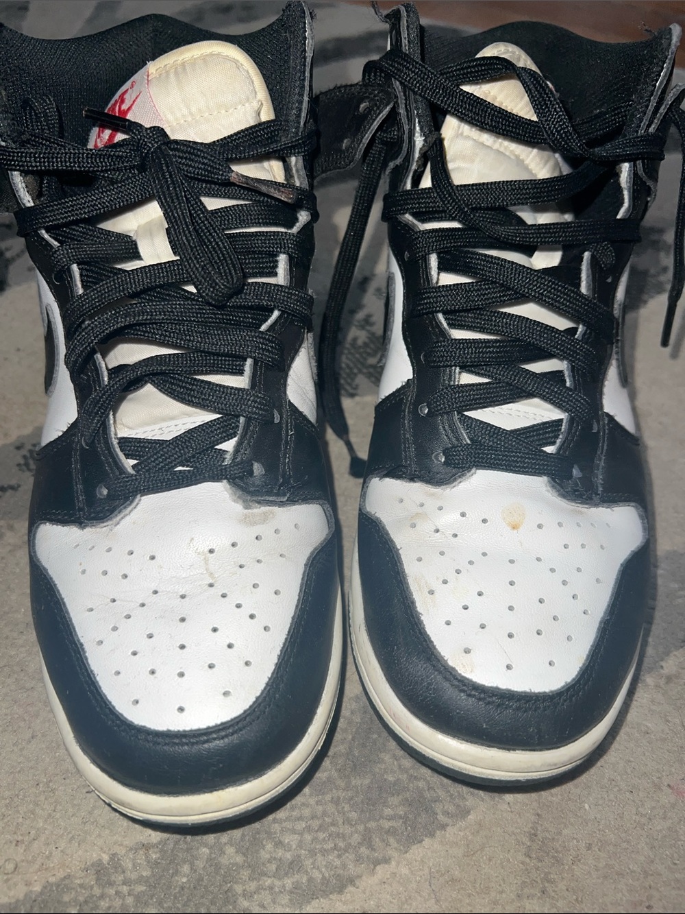Black and White High-Top Nike Sneakers